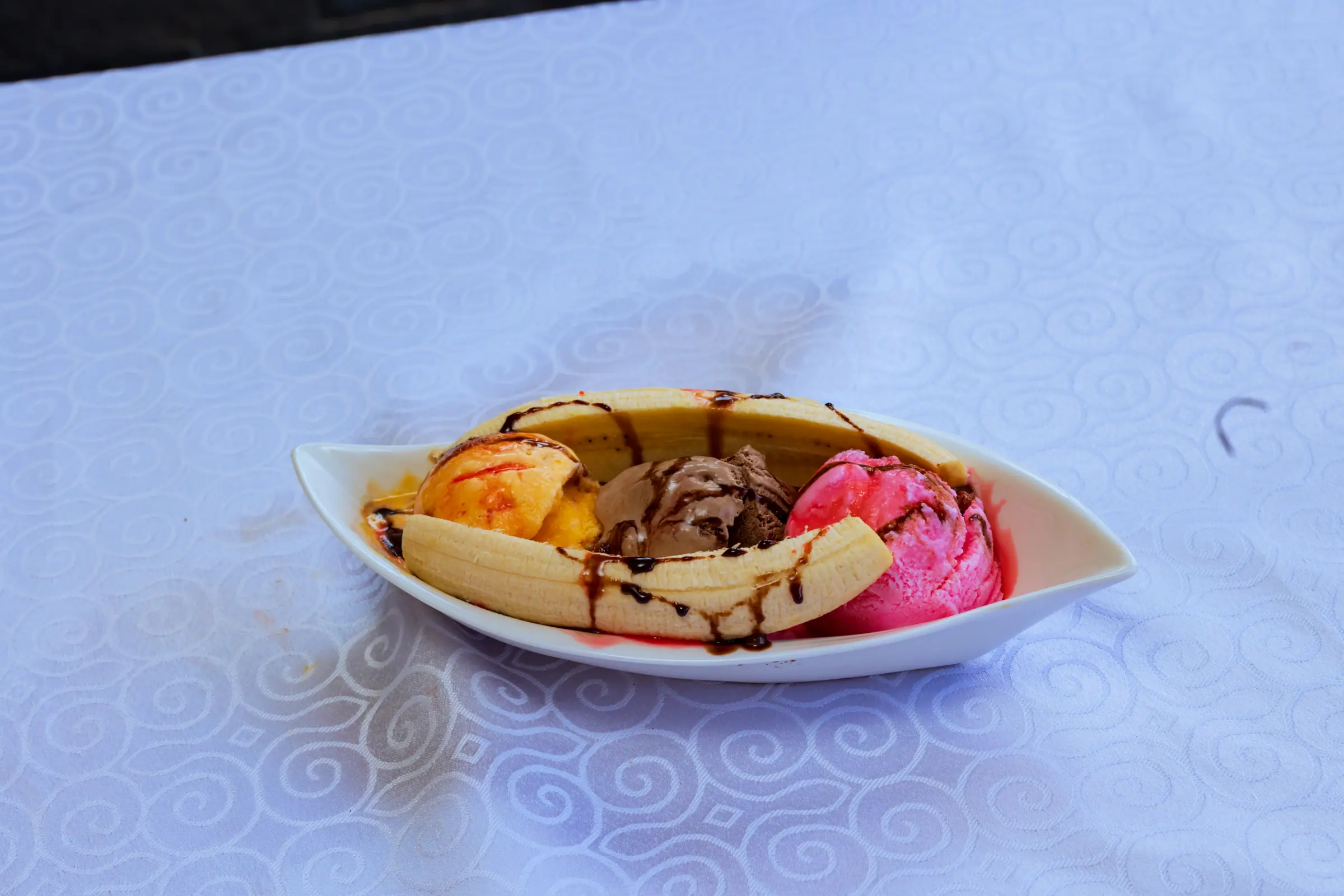 Waffle dessert with ice cream and chocolate sauce